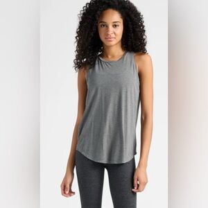Lululemon Ladies Split Back Racer Back Open Flap tank top.